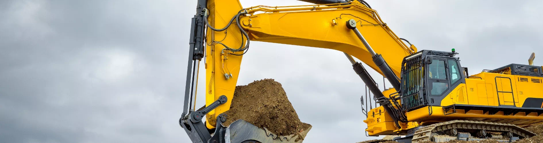 Koparka nabierająca piasek
